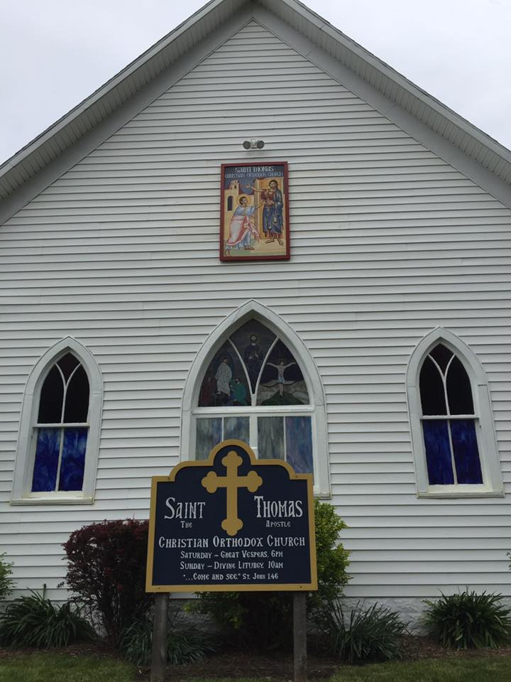 Outdoor wall icon of the Belief of Saint Thomas on the church exterior